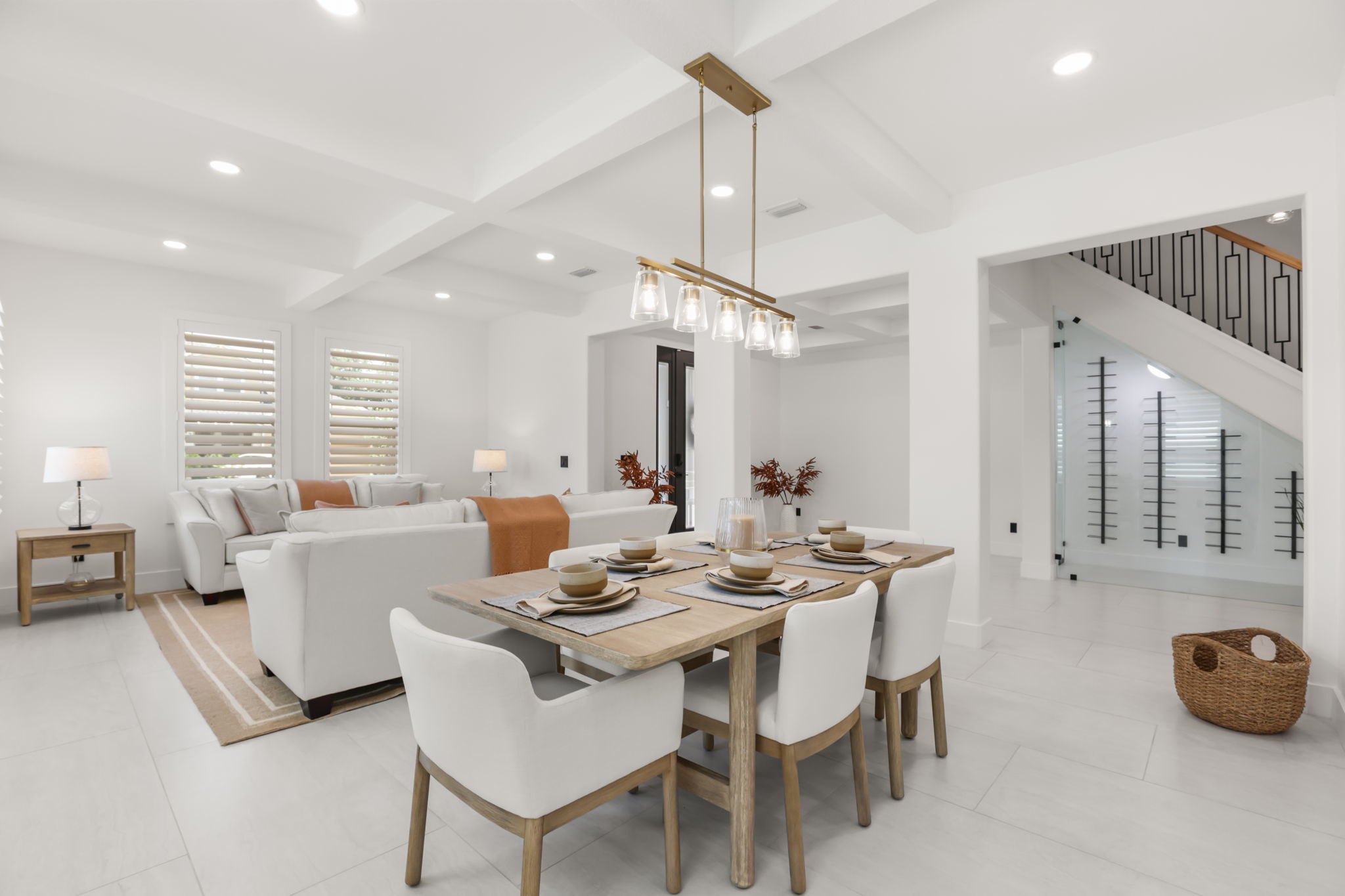 Dining area beside the designer staircase